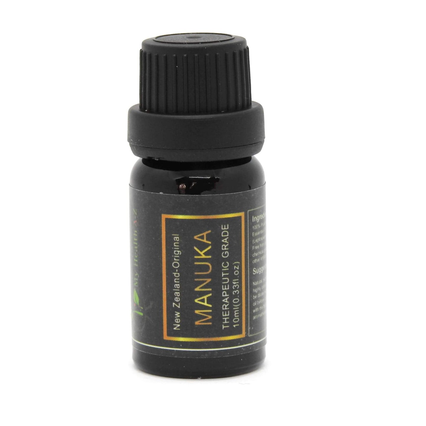 Manuka oil bottle with black cap on a white background