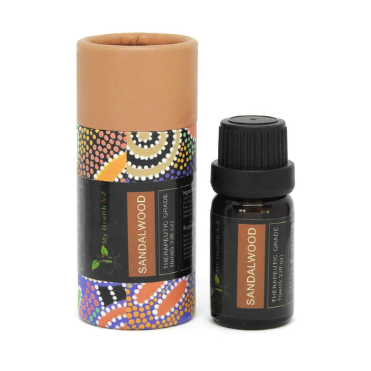 Sandalwood essential oil bottle with decorative packaging on a white background