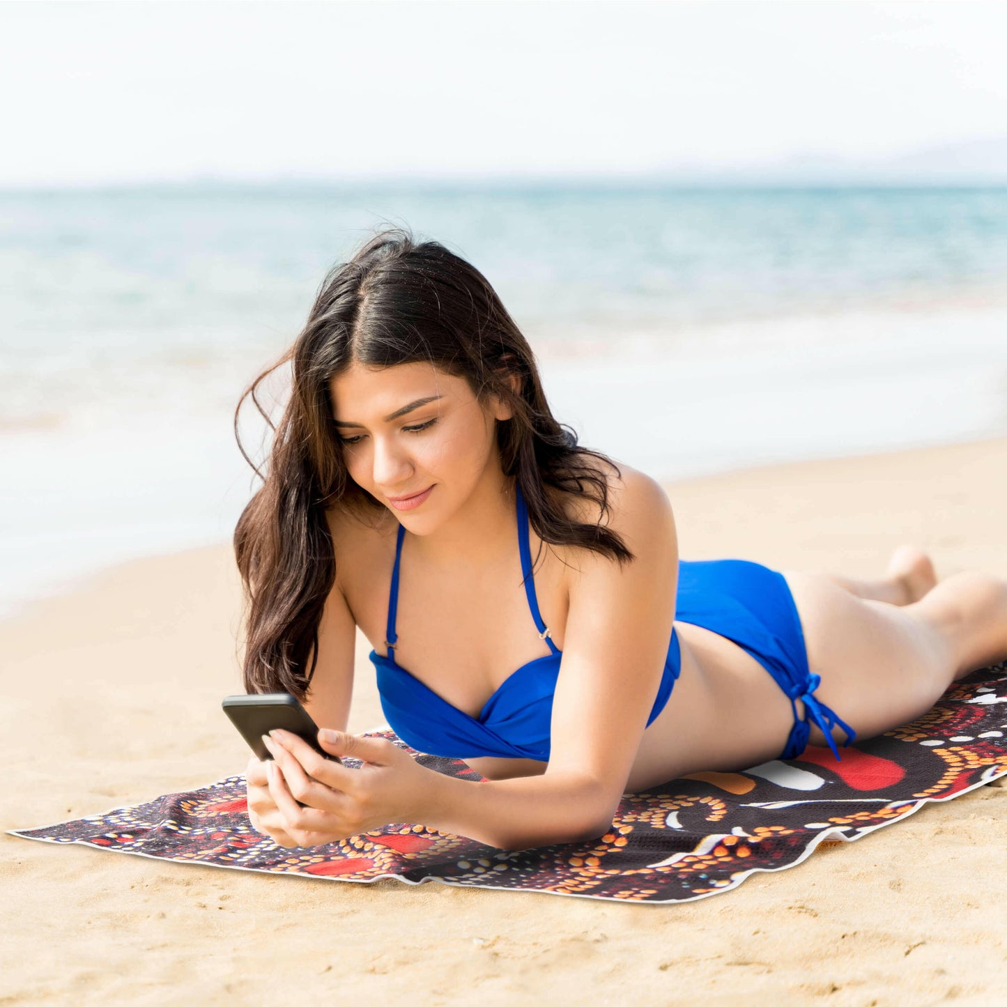 Sand-Free Beach Towel with Aboriginal Dot Kangaroo Design on the beach