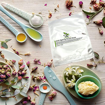 Anti-aging sheet mask with tools and ingredients on a wooden surface