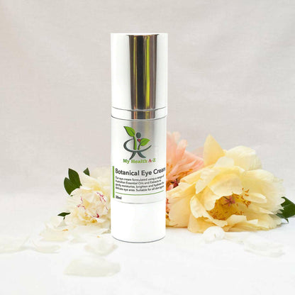Botanical Eye Cream on a bench with yellow and pink flowers
