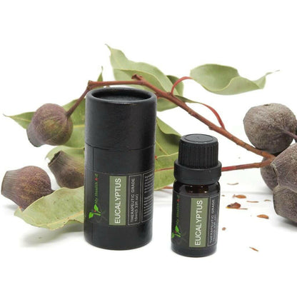 packaging cylinder with open eucalyptus essential oil bottle
