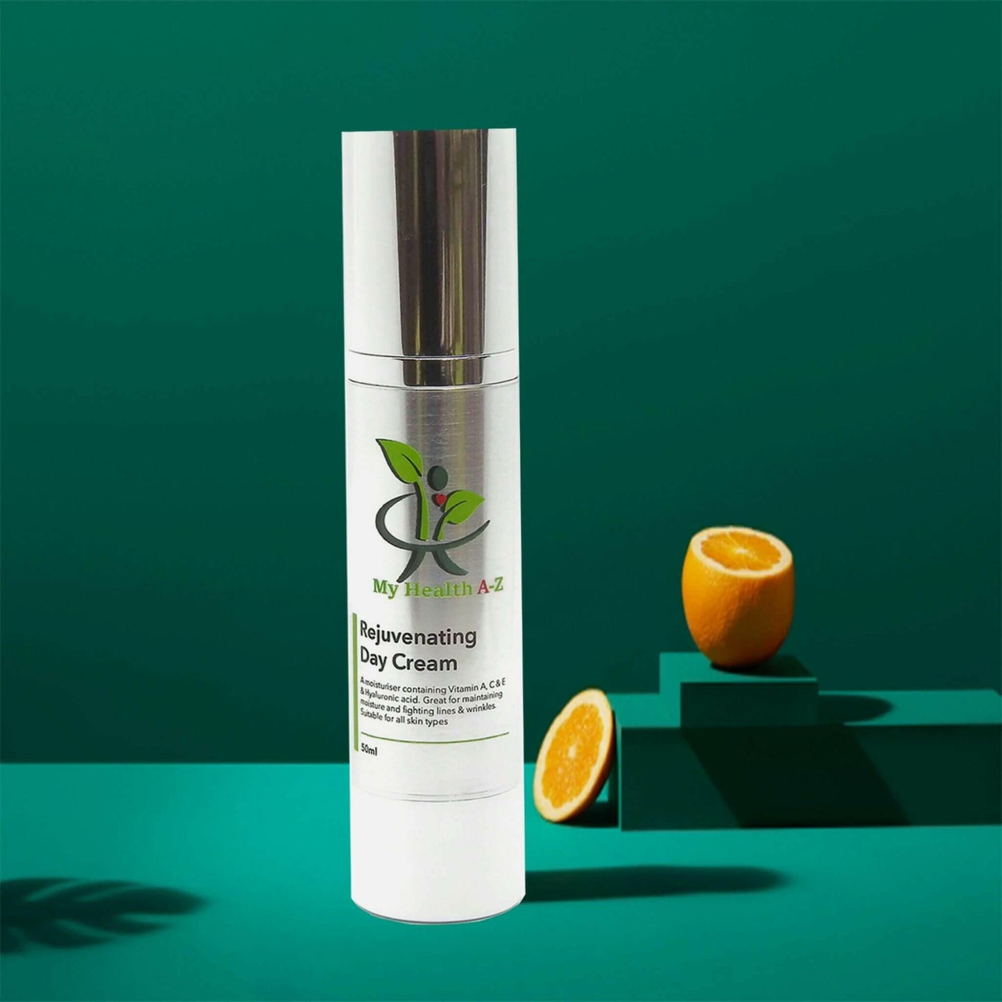 dark green background and a shade of a palm leaf in the middle a bottle  rejuvenating day cream on the right a cut organgee