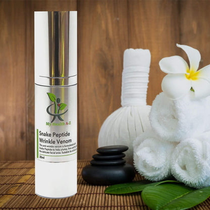 snake peptide wrinkle venom bottle with towels next to it