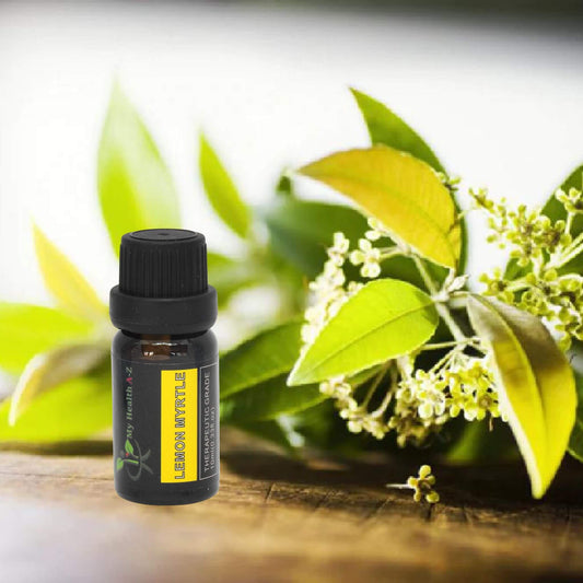 Lemon Myrtle Essential oil bottle with lemon verbena leaves and flowers on a wooden surface