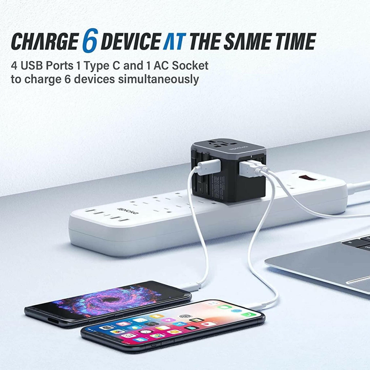 Universal Travel Adapter is charging phones and laptop